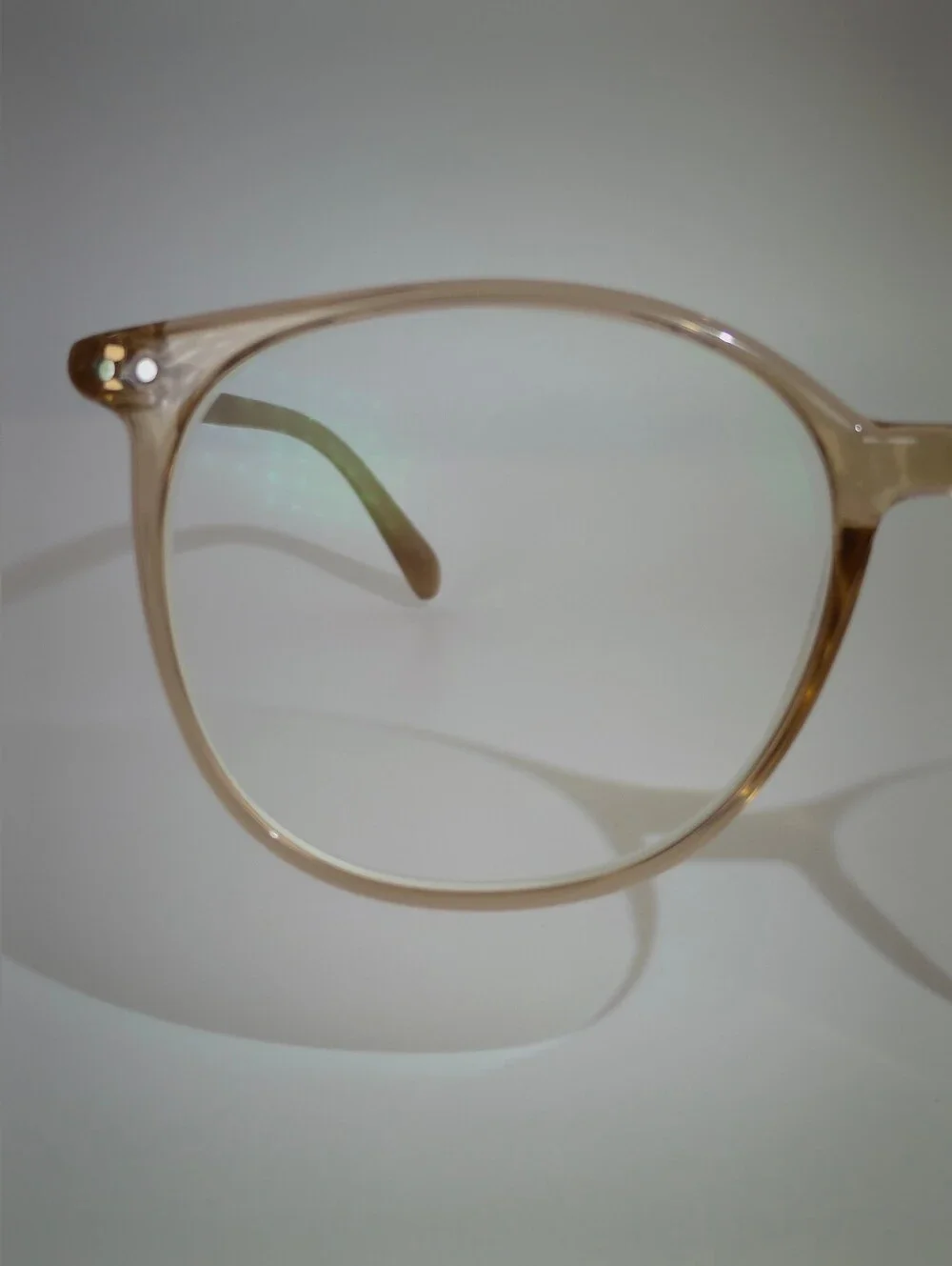 Lucia. Clear Nude Round Frame Glasses. Minimalist Metal.
